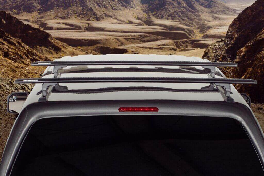 close up Rhino-Rack Roof Rack on a grey pick up truck with a desert background