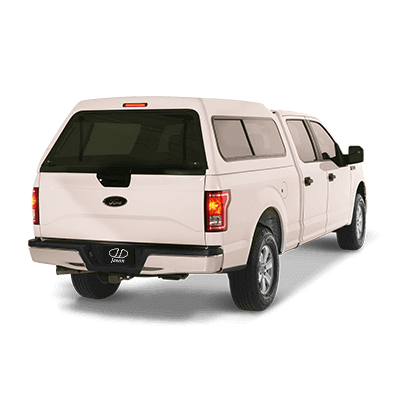 White Ford f-150 with Jason Icon mid-rise truck cap